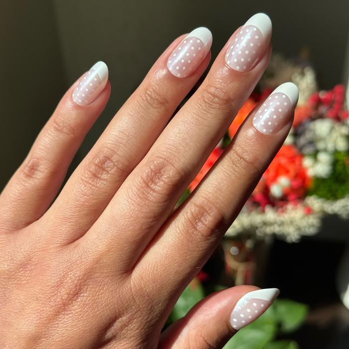 Polka Dot Tights - Press-On | Medium | Oval with white polka dots and chrome french manicure on medium oval false nails