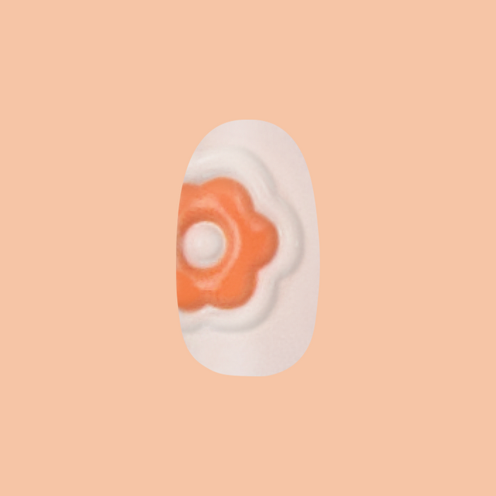 Puffy Bubble Flowers - Press-On | Short | Round neutral base with raised orange floral design for quick at home mani