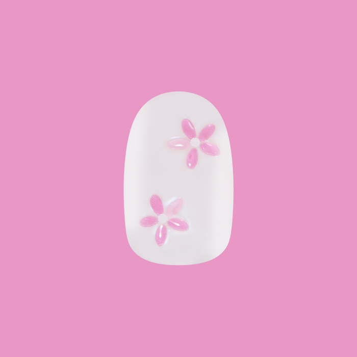 Puffy Petal Iridescent - Press-On | Short | Round sheer nail with iridescent finish and raised pink floral design