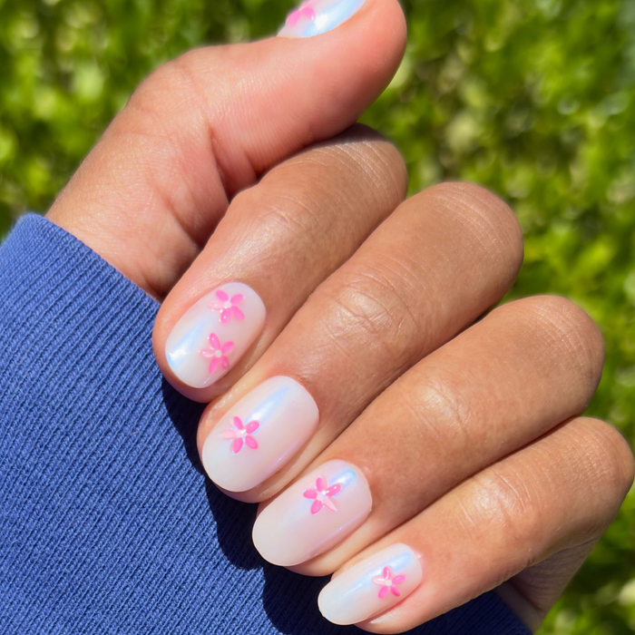 Puffy Petal Iridescent - Press-On | Short | Round sheer nails with pink 3D floral accents for a quick at-home mani