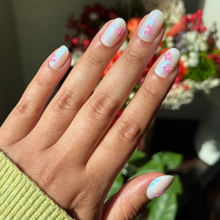Puffy Petal Iridescent - Press-On | Short | Round sheer nails with iridescent polish and raised pink flower accents manicure
