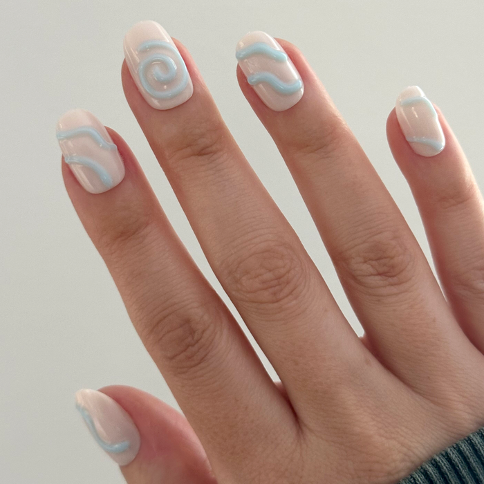Puffy Swirls - Press-On | Short | Round neutral nails with raised light blue swirled details for easy at home manicure