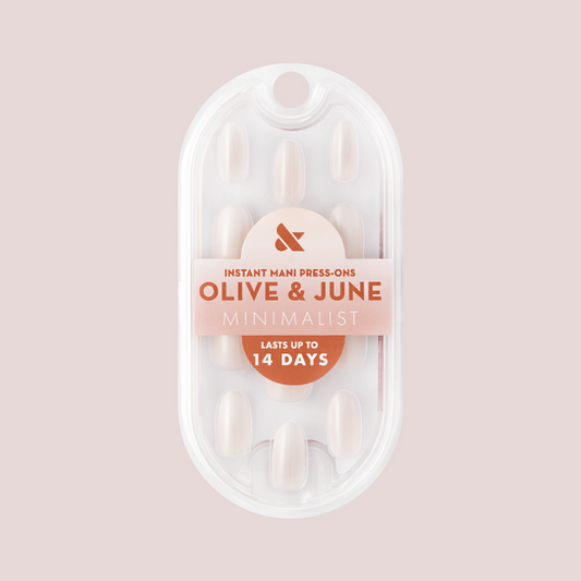 Pure White Syrup Gradient - Press-On | Medium | Oval showing packaged medium oval white gradient press-on false nails by Olive & June