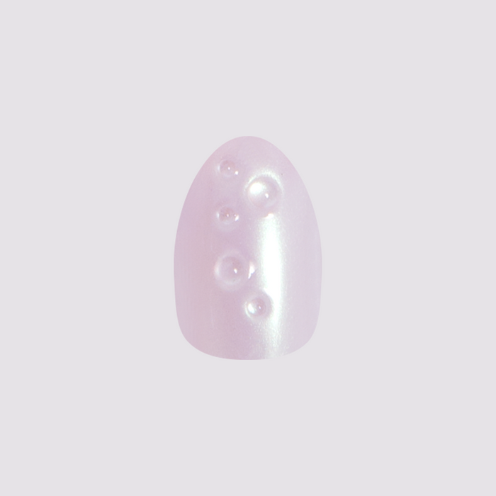 Purple Puka Raindrops - Press-On | Short | Almond featuring iridescent lavender nail with raised 3D raindrop details for at-home mani
