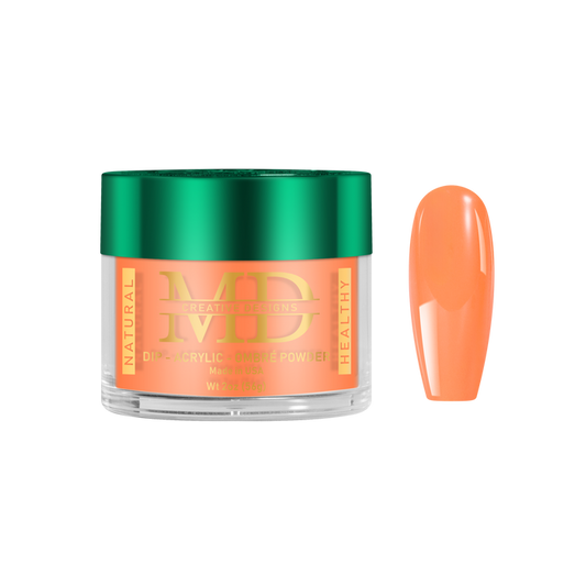 Jar of MD acrylic powder with a matching orange nail tip color swatch on a white background