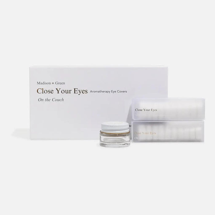 Box and clear jar with aromatherapy eye cover pads and wrapped tray