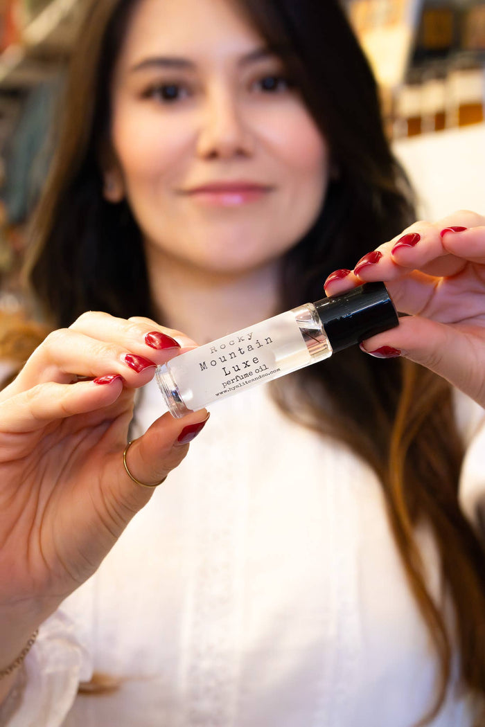 Hyalite & Co Roll-On Perfume Oil with a sleek glass bottle and metal rollerball for easy application