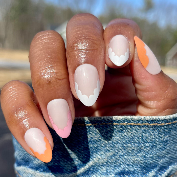 Scalloped French - Press-On | Medium | Almond nails with pastel scallop tips for an easy at-home manicure look