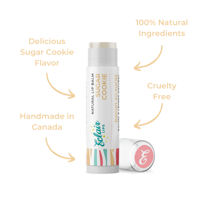 Lip balm tube labeled Sugar Cookie with a lid.