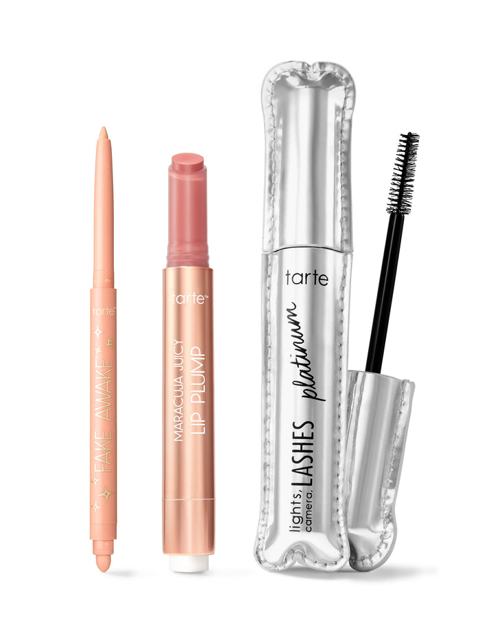 Tarte makeup products including a lip plump, eyeliner, and mascara on a white background