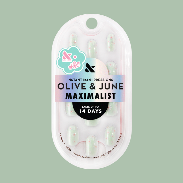 Teal Chrome Flower Shower - Press-On | Short | Round pastel teal press-on nails with daisy designs in clear packaging on green background