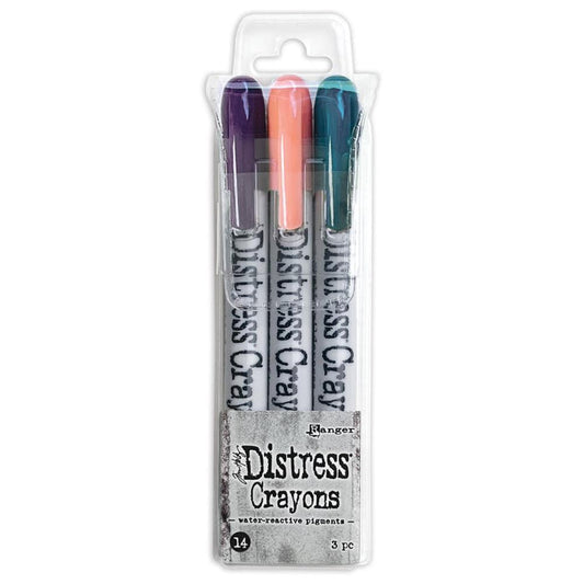 Tim Holtz - Distress Crayon Set - Set #14. Tim Holtz Distress Crayons are formulated to achieve vibrant coloring effects on porous surfaces for mixed-media. The smooth water-reactive pigments are ideal for creating backgrounds, watercoloring and more. Available at Embellish Away located in Bowmanville Ontario Canada.