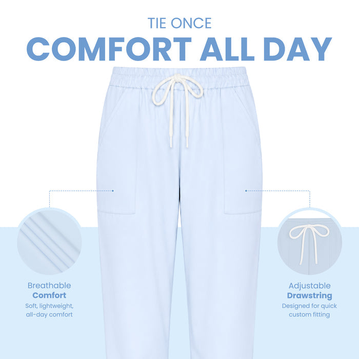 Uk Scrub Supply Light blue drawstring lounge pants centered on a white and pale blue background, with marketing text reading 'TIE ONCE COMFORT ALL DAY' and callout circles highlighting breathable comfort and adjustable drawstring features.