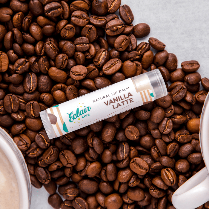 Vanilla Latte lip balm on coffee beans